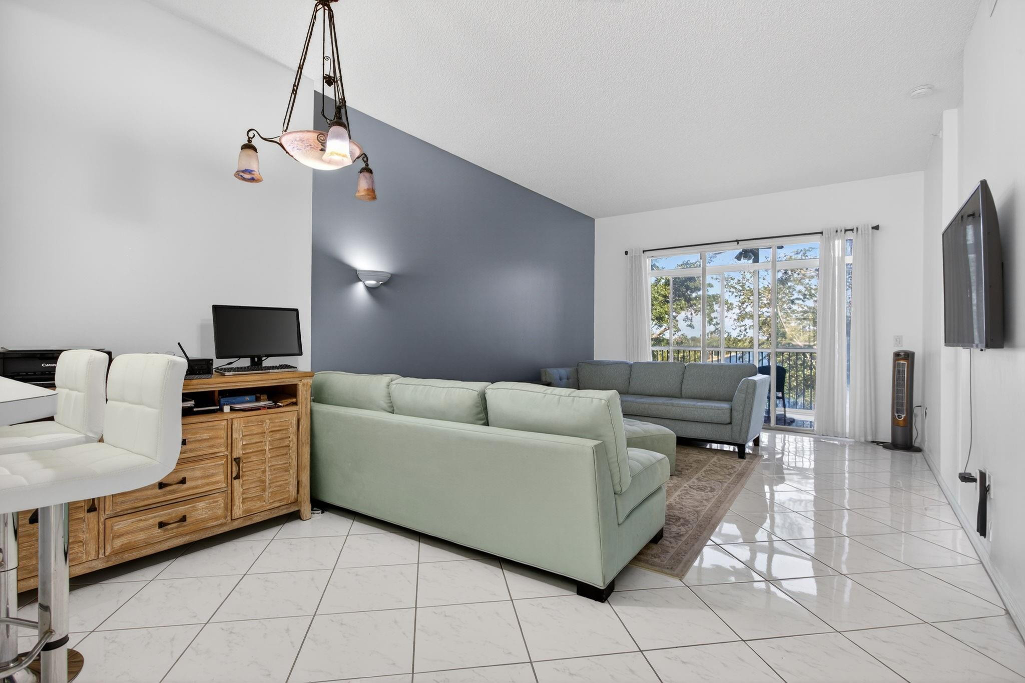 9575 Weldon Circle, Unit C413 Tamarac, FL 33321 - Photo 19 of 65 Main family room