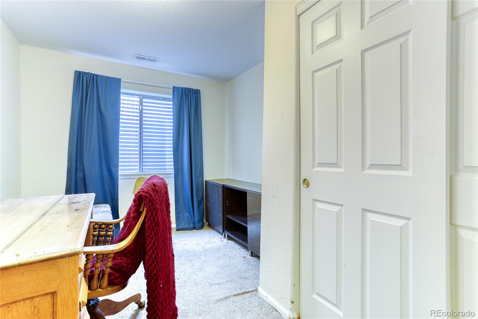 4425 Iran Street Denver, CO 80249 - Photo 30 of 36 a view of a room with windows