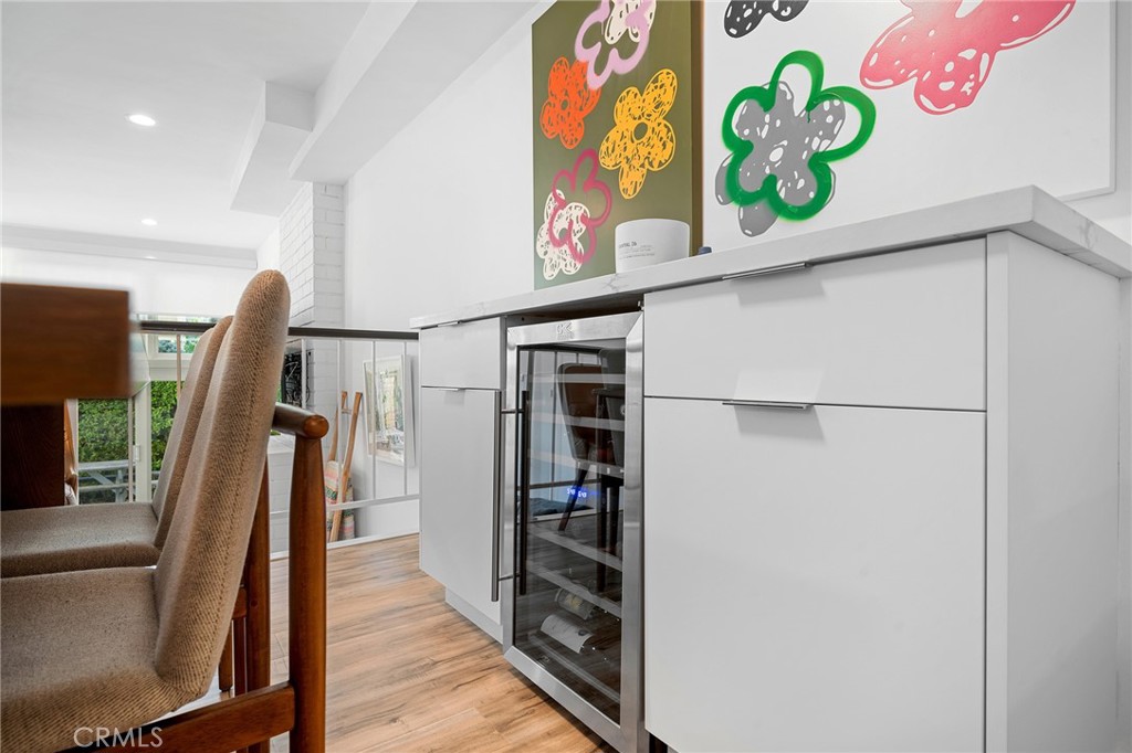 5435 Yarmouth Avenue, Unit 7 Encino, CA 91316 - Photo 12 of 31 a view of a hallway with wooden floor and staircase