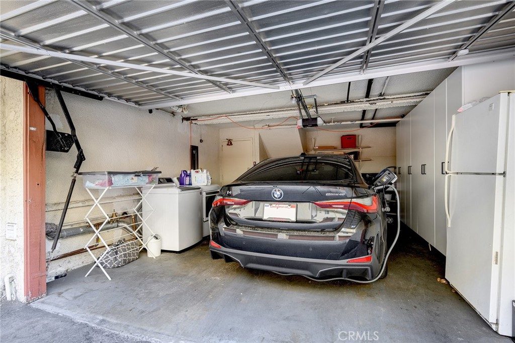 5435 Yarmouth Avenue, Unit 7 Encino, CA 91316 - Photo 25 of 31 a car parked in a garage