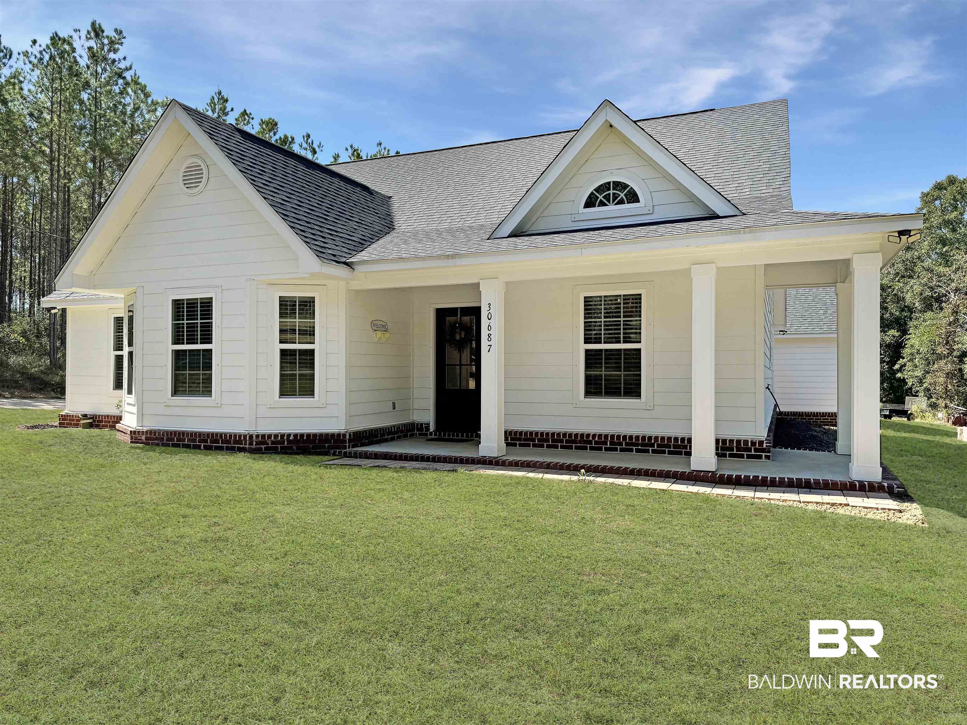 30687 Brady Road Robertsdale, AL 36567 - Photo 3 of 53 Looking onto the front porch.