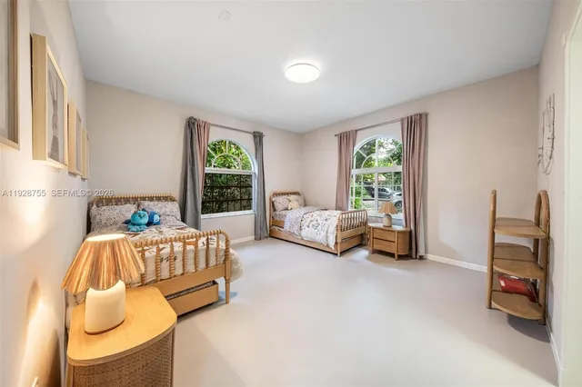 a bedroom with furniture and a couch