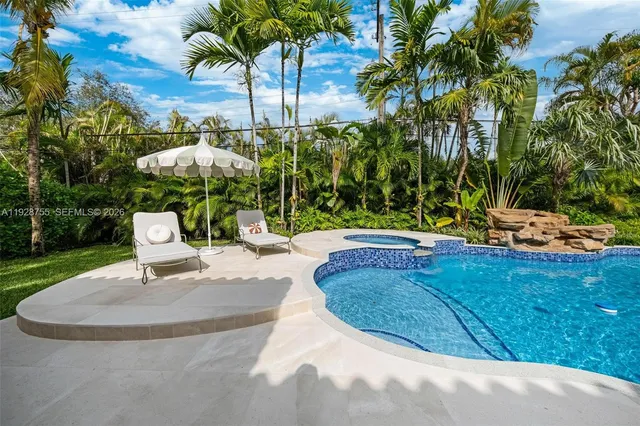 a spacious bedroom with a bed and a walk in closet