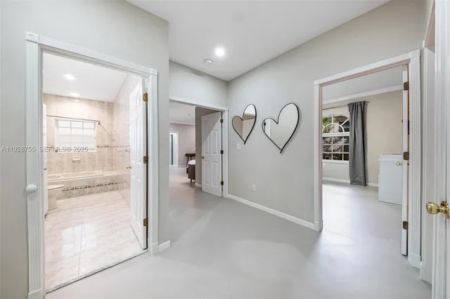 a view of a refrigerator in kitchen and wooden floor