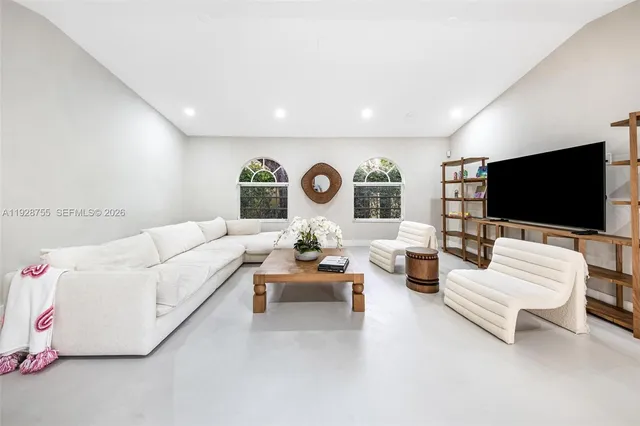 a view of a swimming pool with a lounge chair