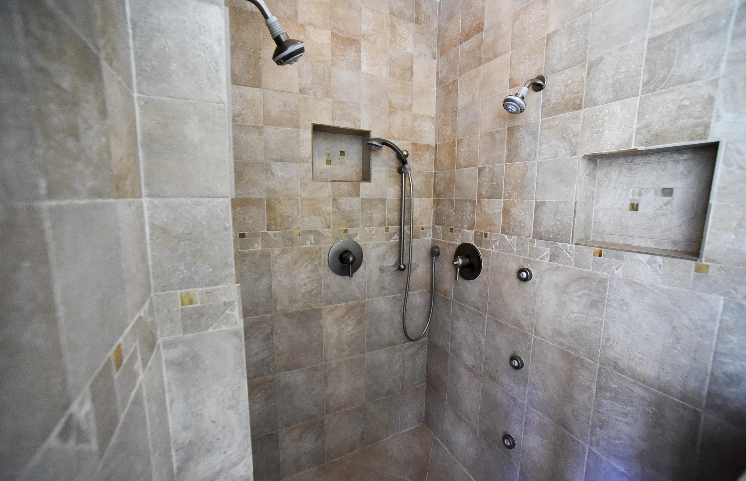 552 Southwest St Lucie Crescent Stuart, FL 34994 - Photo 16 of 36 a bathroom with a shower