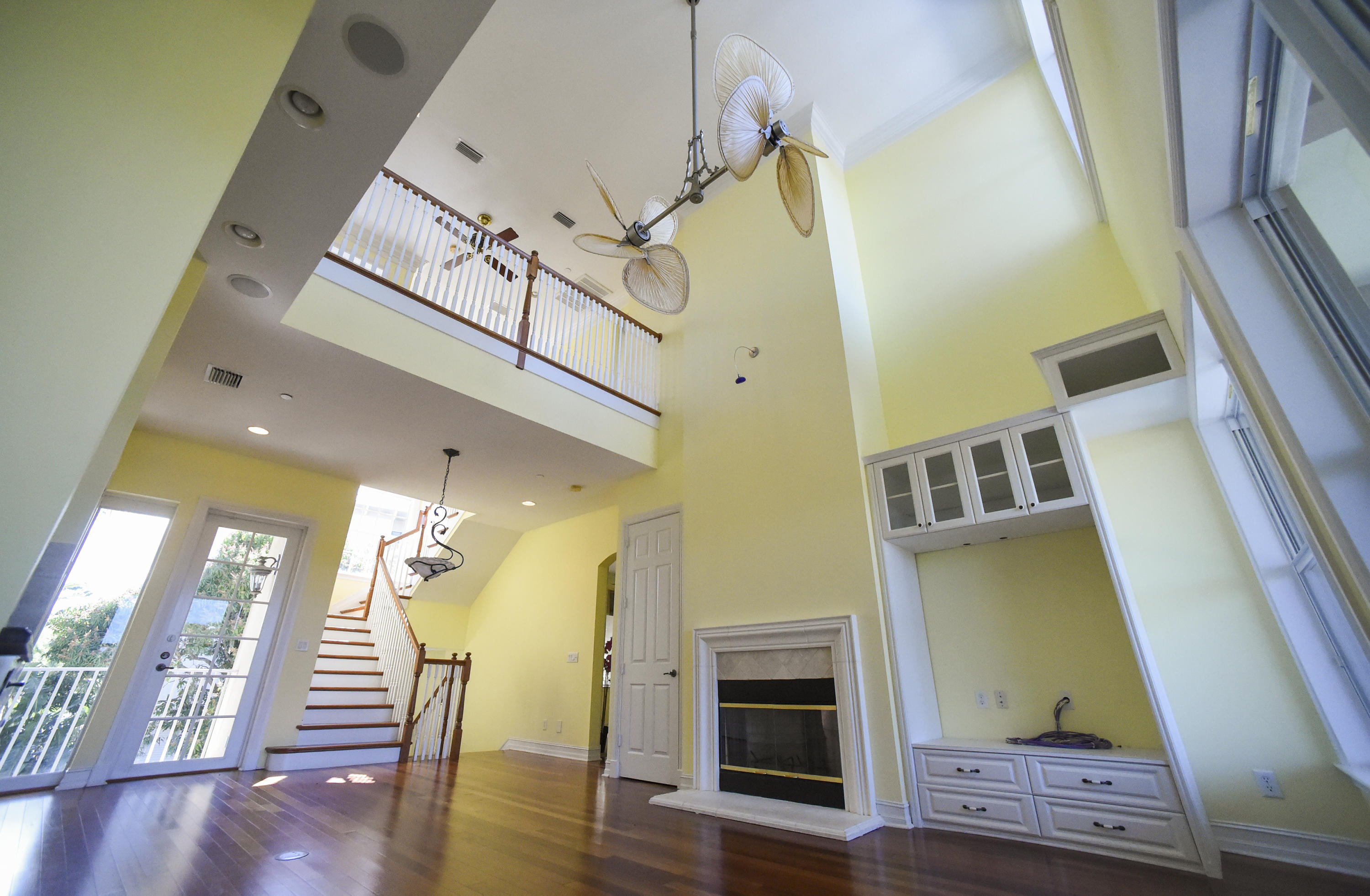 552 Southwest St Lucie Crescent Stuart, FL 34994 - Photo 2 of 36 a view of entryway and hall with wooden floor