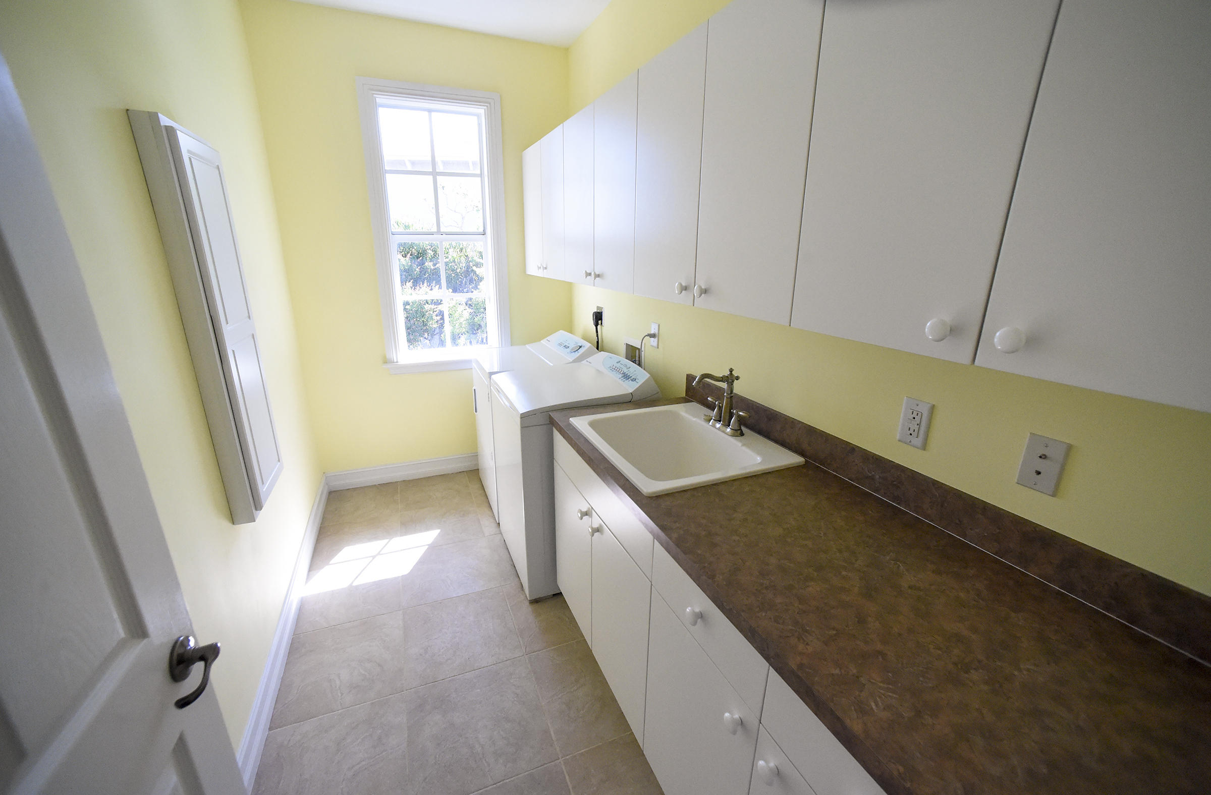 552 Southwest St Lucie Crescent Stuart, FL 34994 - Photo 24 of 36 a view of a kitchen with sink and dishwasher