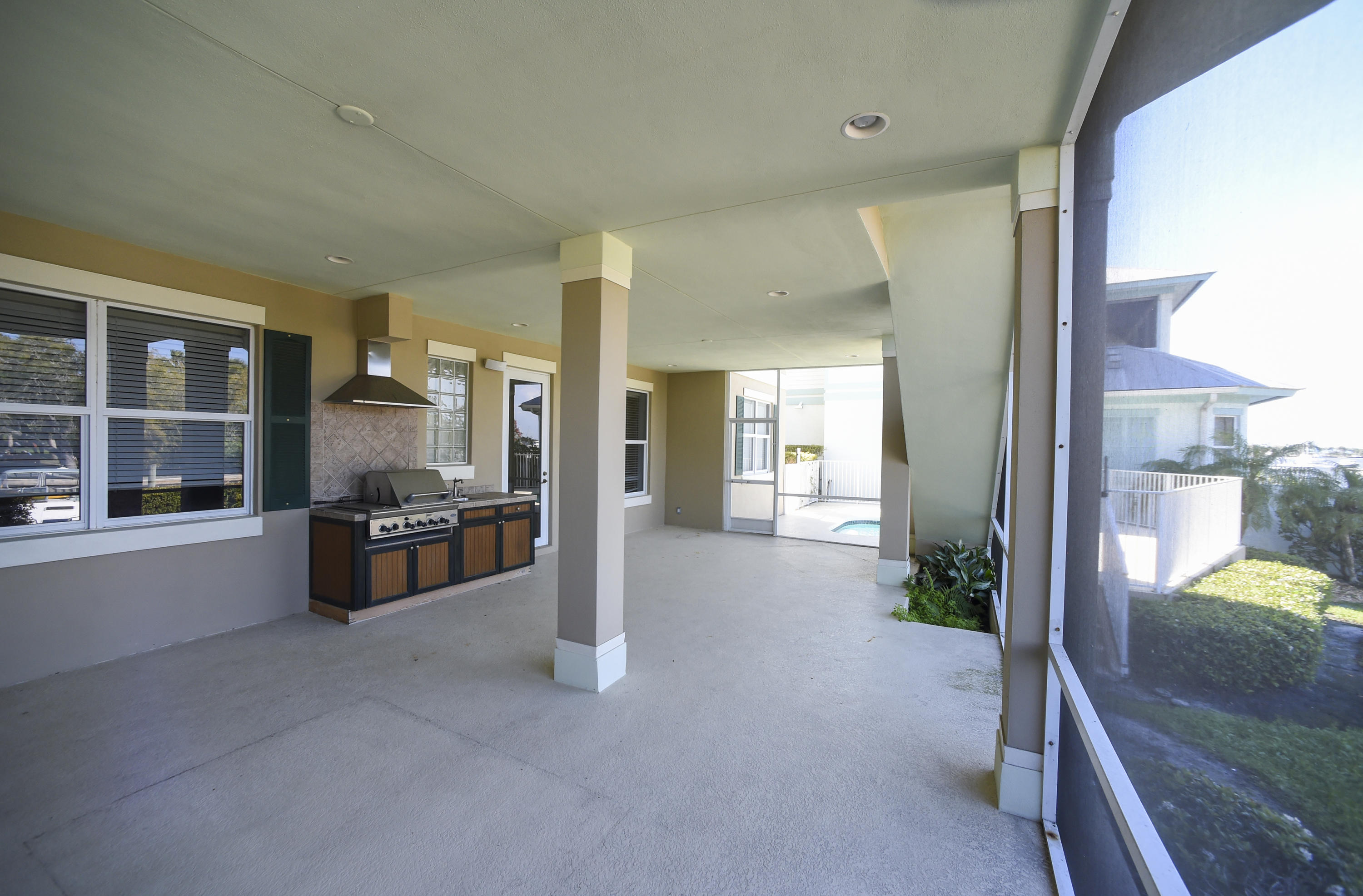 552 Southwest St Lucie Crescent Stuart, FL 34994 - Photo 26 of 36 a living room with furniture and a large window