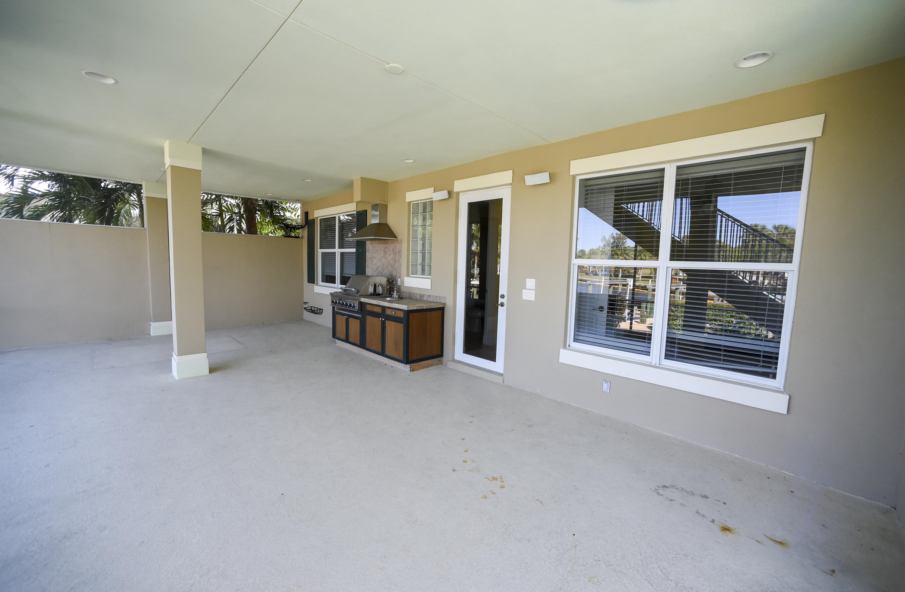 552 Southwest St Lucie Crescent Stuart, FL 34994 - Photo 27 of 36 an empty room with entrance and windows