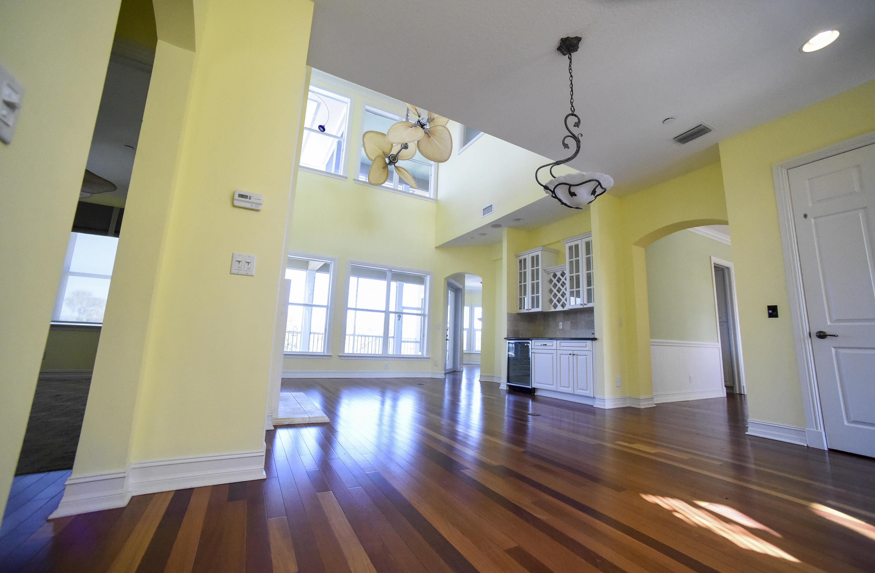 552 Southwest St Lucie Crescent Stuart, FL 34994 - Photo 3 of 36 a view of an entryway with wooden floor