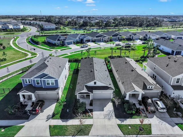 an aerial view of a house with a garden