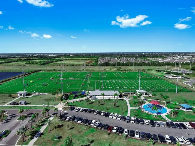 a view of a golf course with a garden