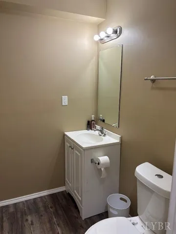 a room with furniture and gym equipment