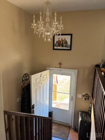 a bathroom with a sink a mirror and window