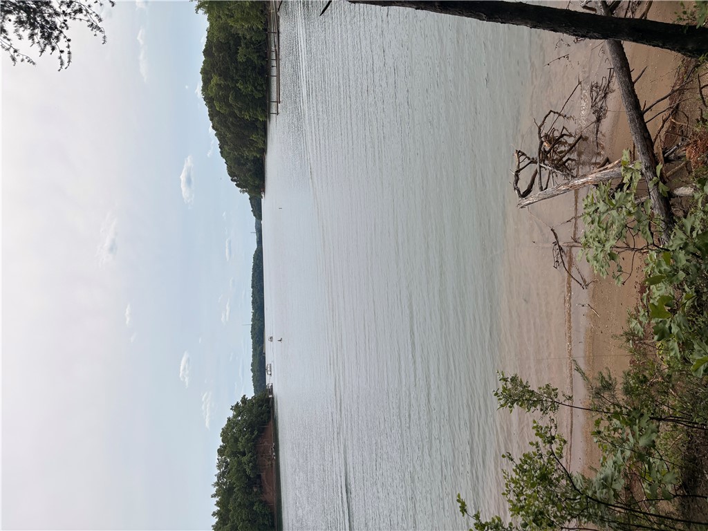 Scenic views unfold along the gentle shores of  Lake Keowee, offering a peaceful waterfront experience.