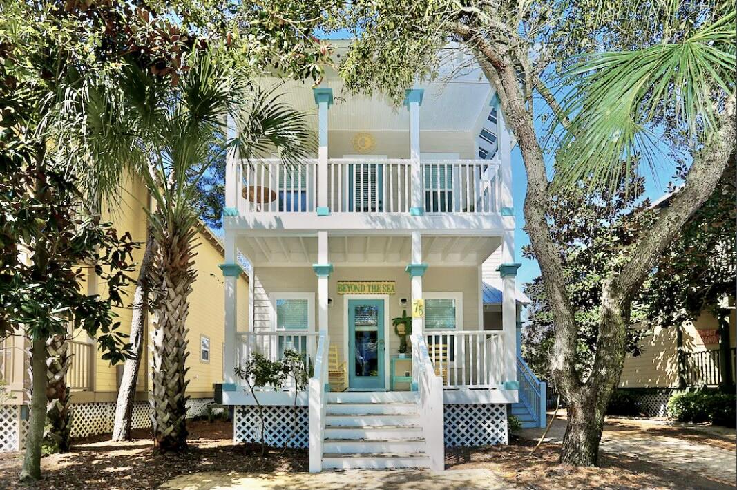 75 Hidden Lake Way Santa Rosa Beach, FL 32459 - Photo 3 of 49 a front view of a house with garden