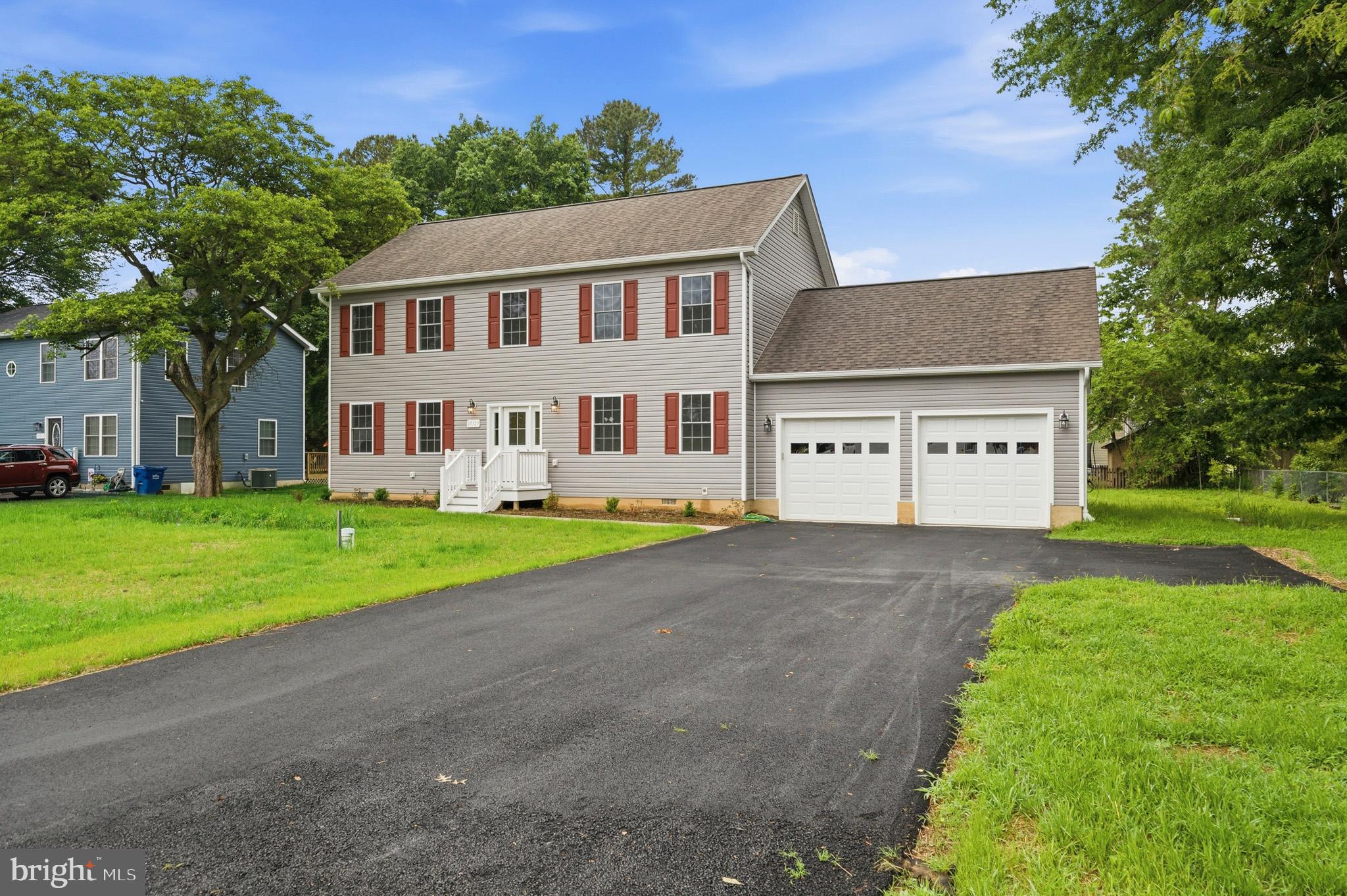 29725 Bruce Road Mechanicsville, MD 20659 - Photo 14 of 79 a view of an house with backyard space and balcony