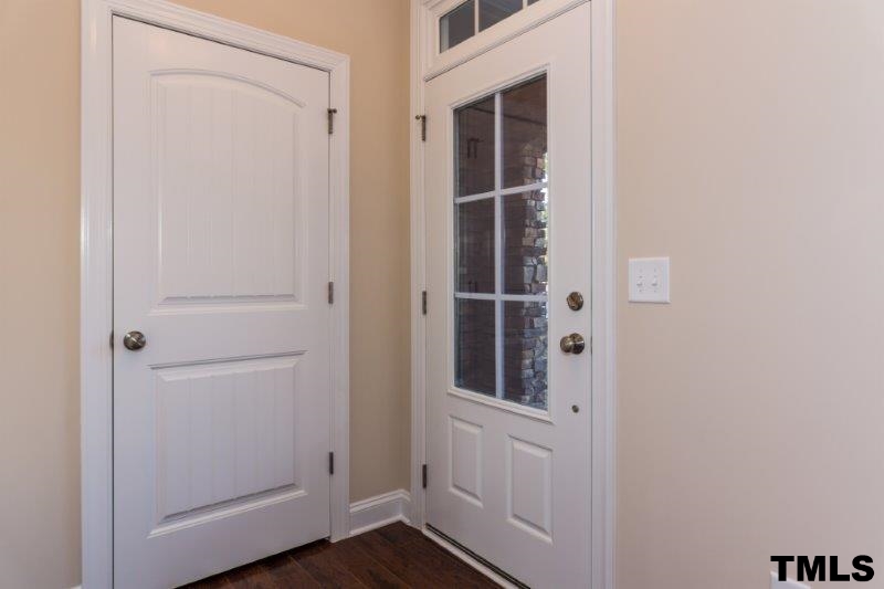 2360 Noble Road Raleigh, NC 27608 - Photo 4 of 24 a view of wooden door