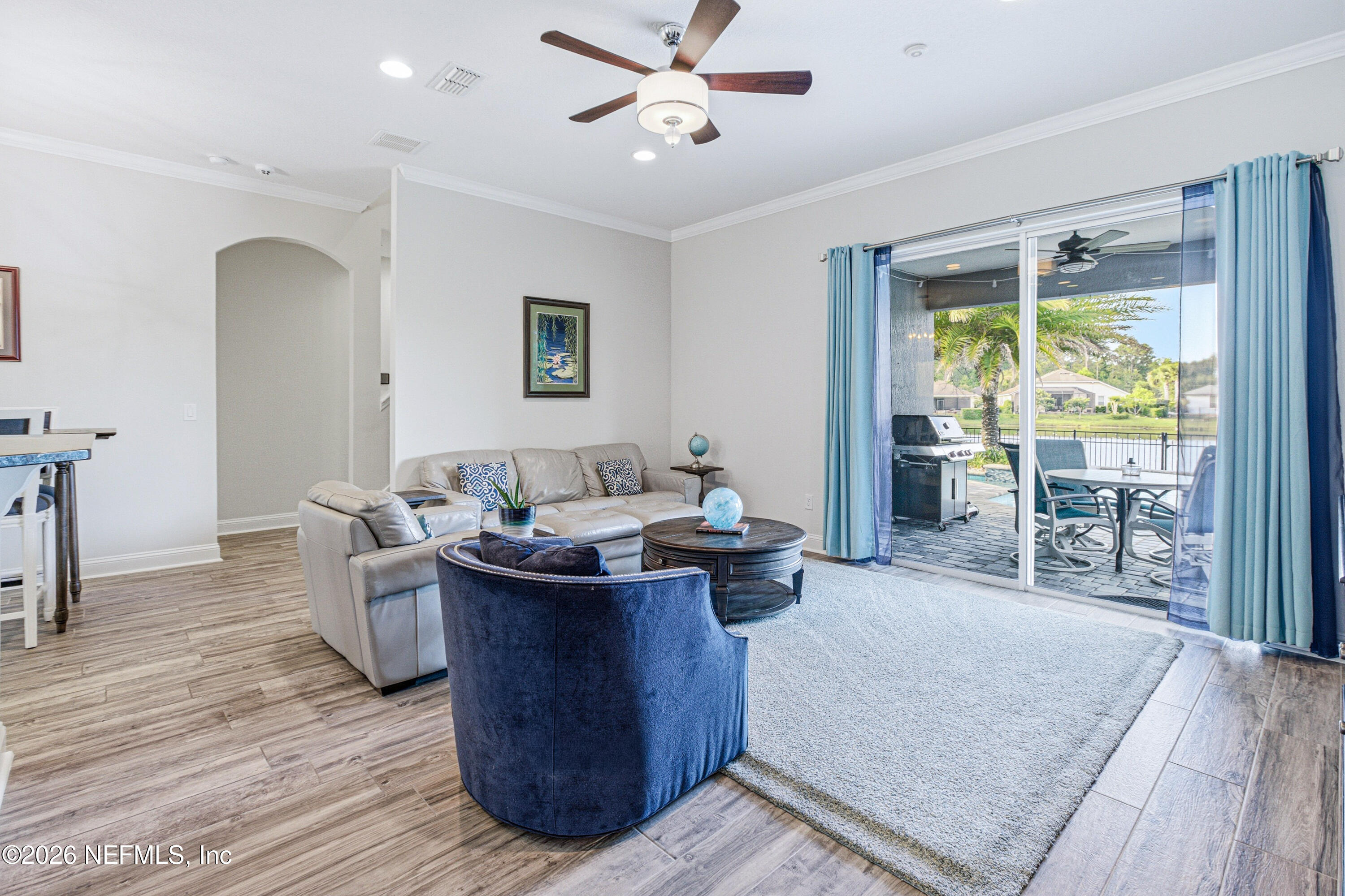 191 South Arabella Way St. Johns, FL 32259 - Photo 18 of 57 a living room with a couch and a table