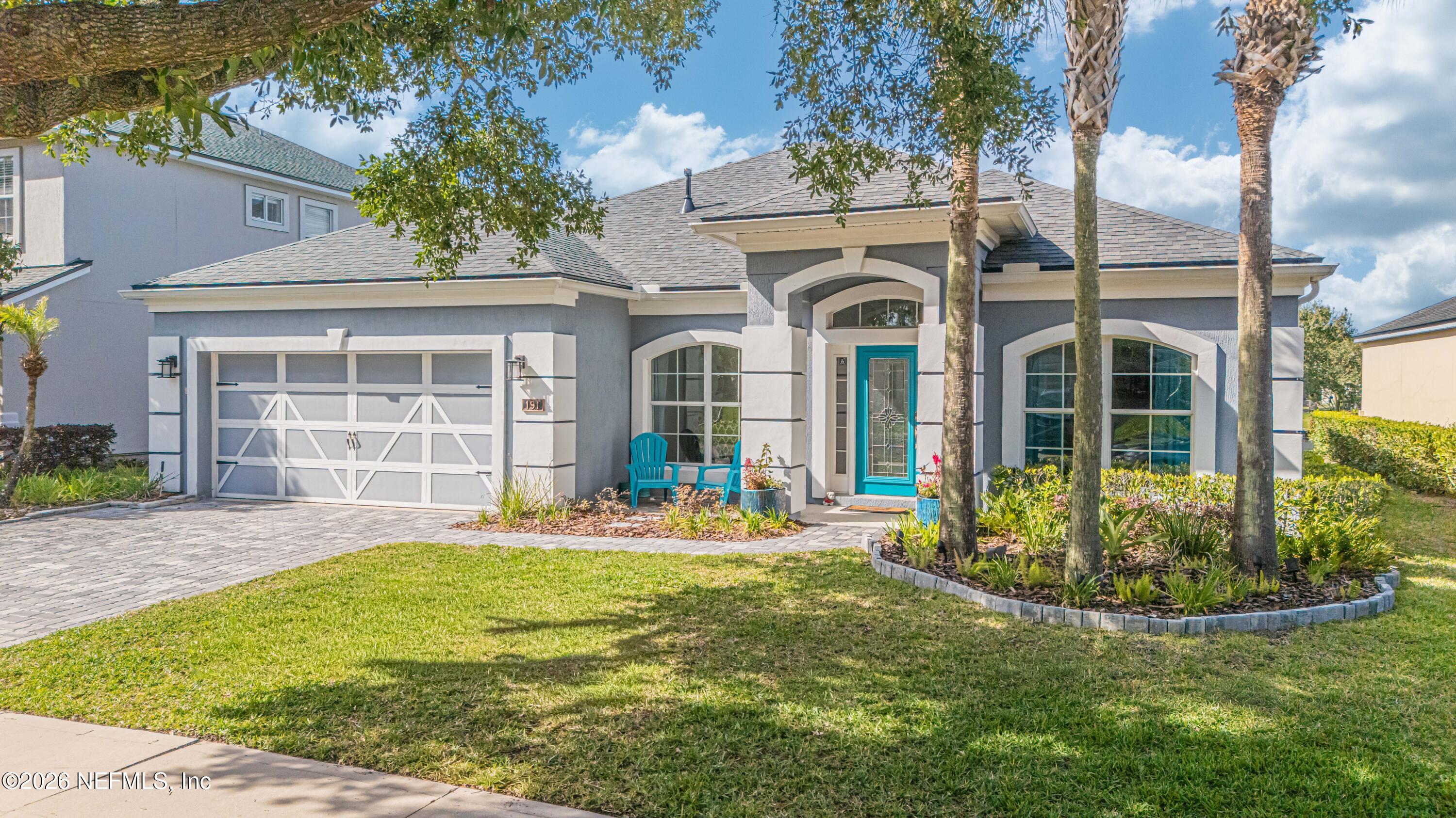191 South Arabella Way St. Johns, FL 32259 - Photo 2 of 57 front view of a house with a yard