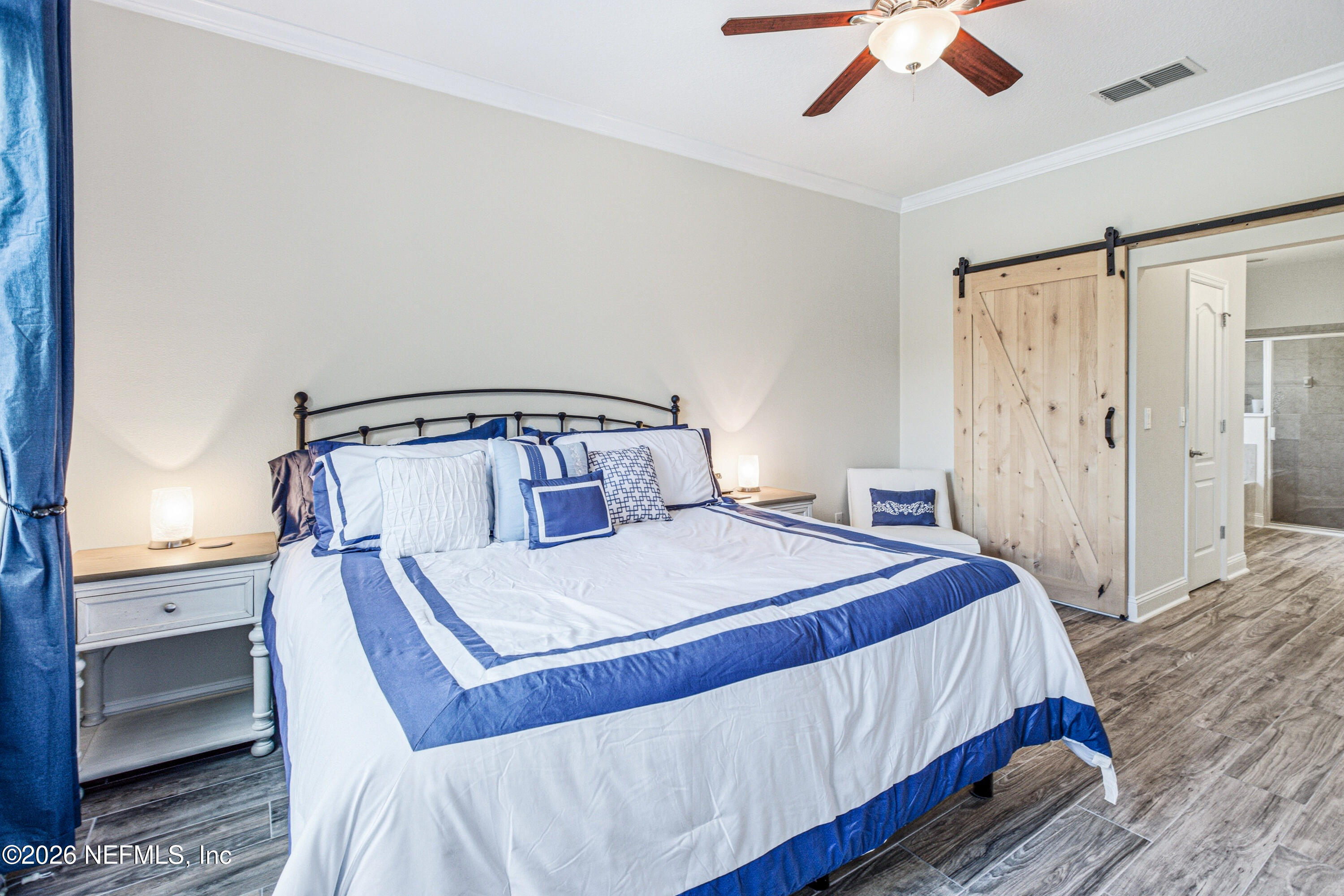 191 South Arabella Way St. Johns, FL 32259 - Photo 25 of 57 a bedroom with a bed and ceiling fan