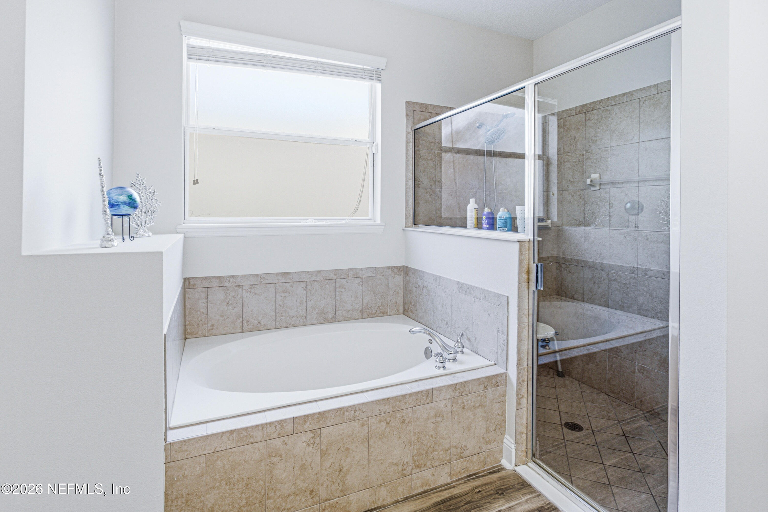 191 South Arabella Way St. Johns, FL 32259 - Photo 28 of 57 a white bath tub sitting next to a shower