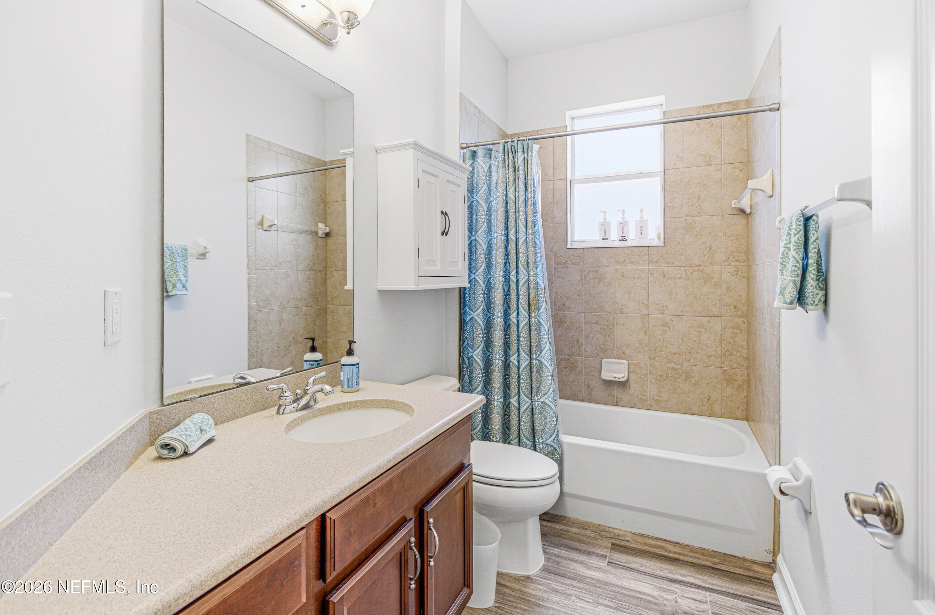 191 South Arabella Way St. Johns, FL 32259 - Photo 31 of 57 a bathroom with a granite countertop sink toilet and shower