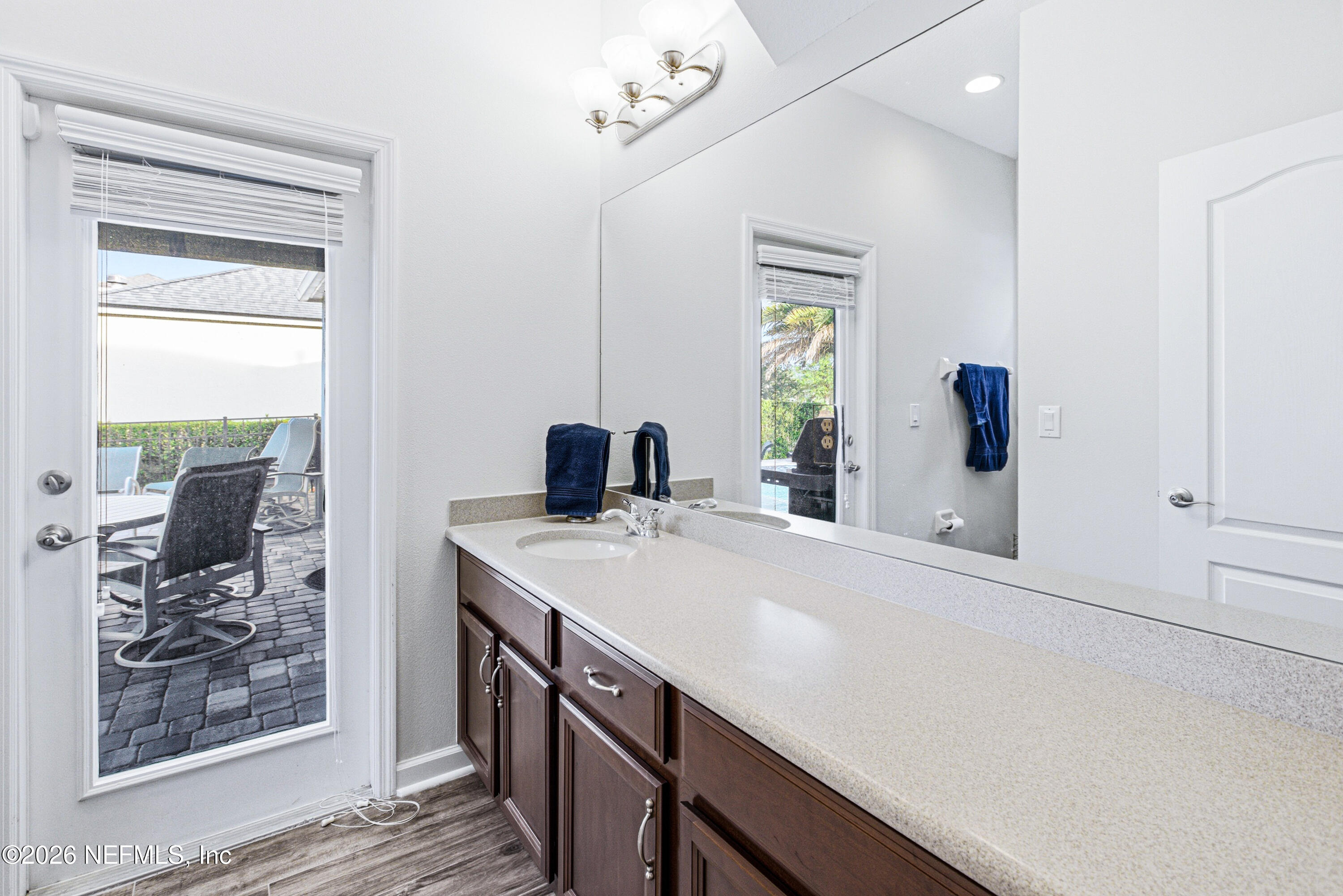 191 South Arabella Way St. Johns, FL 32259 - Photo 36 of 57 a view of a bathroom with a sink and mirror