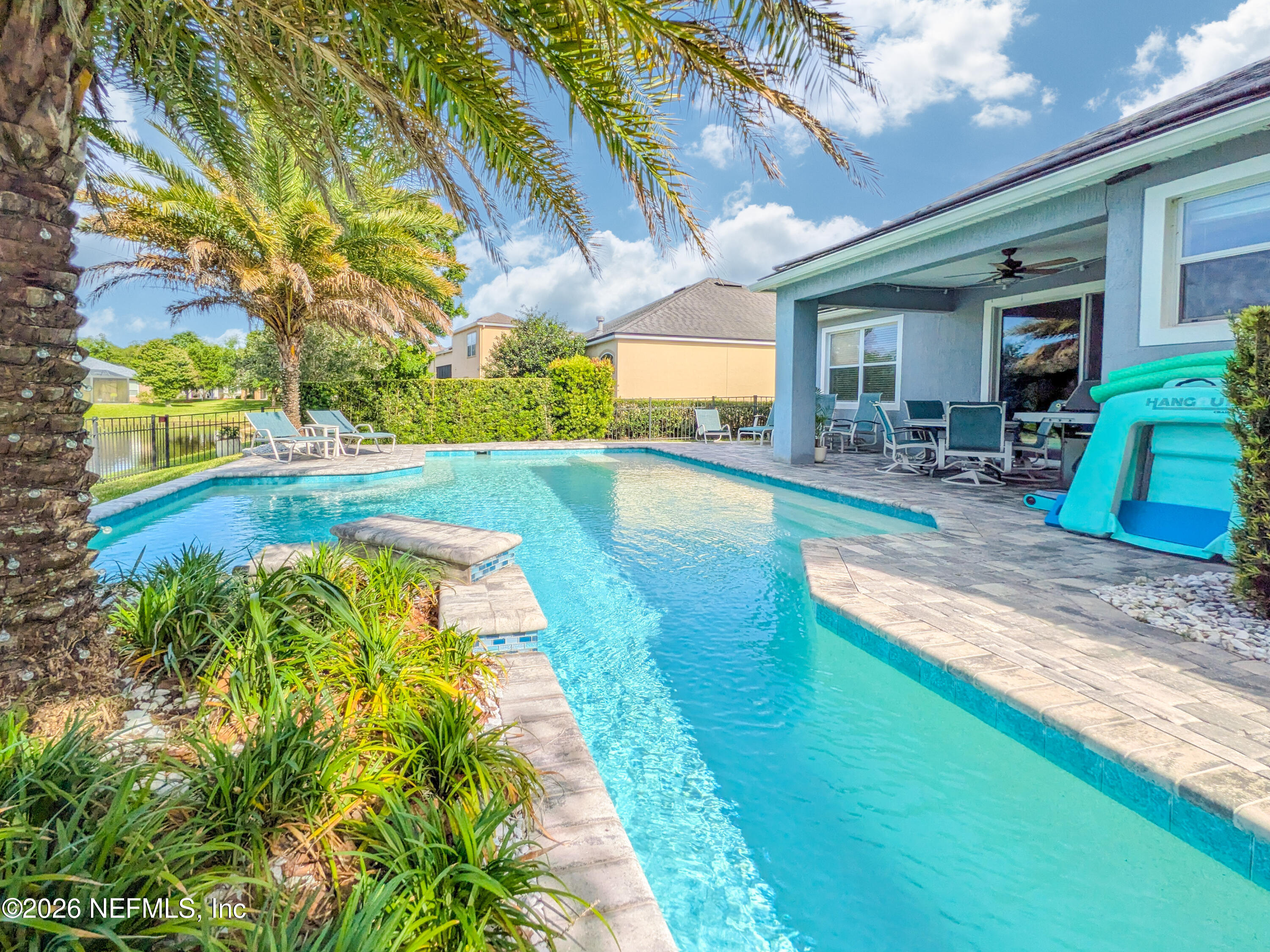 191 South Arabella Way St. Johns, FL 32259 - Photo 4 of 57 a view of a swimming pool with a patio