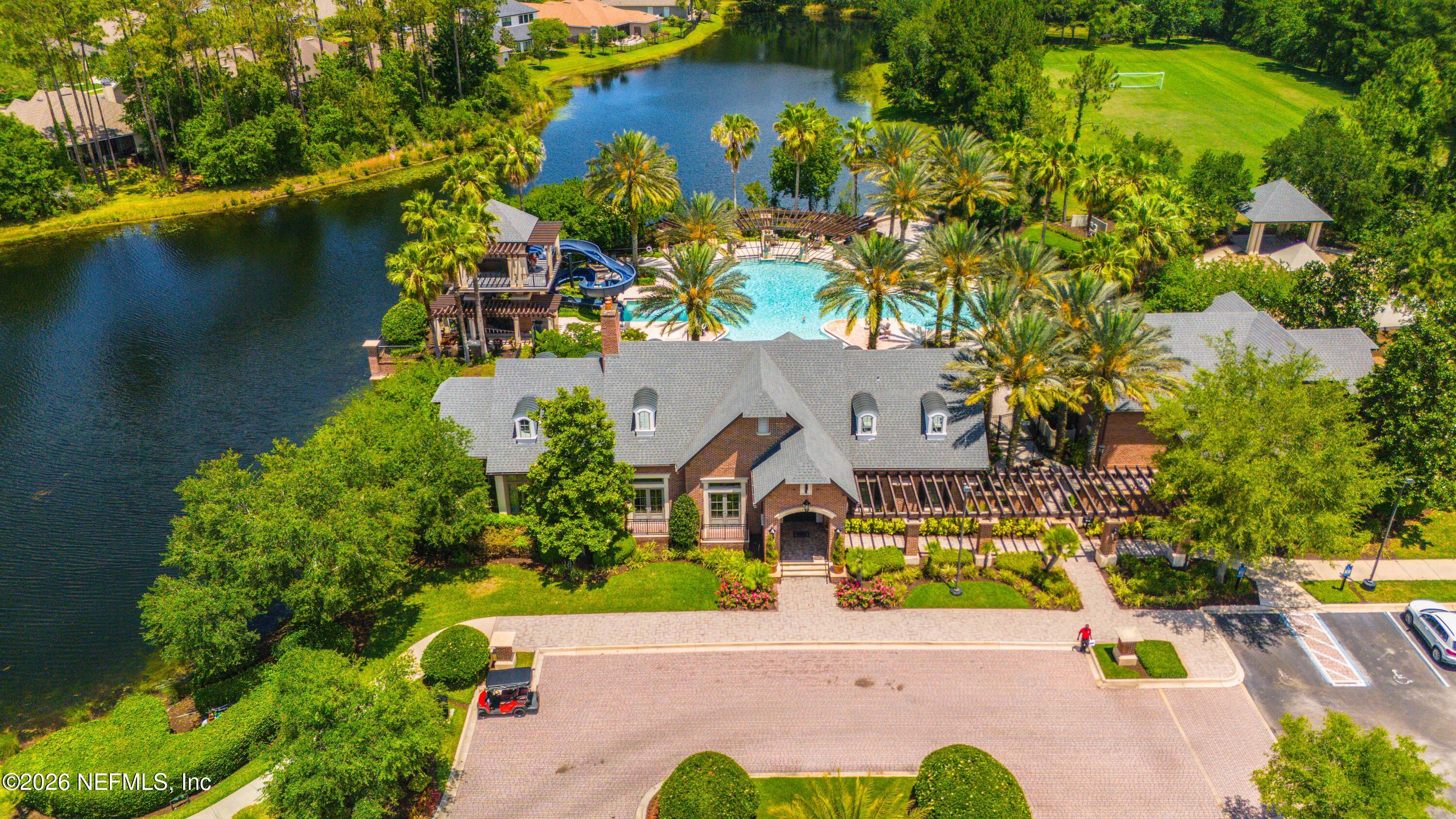 191 South Arabella Way St. Johns, FL 32259 - Photo 44 of 57 an aerial view of a house with a garden and swimming pool