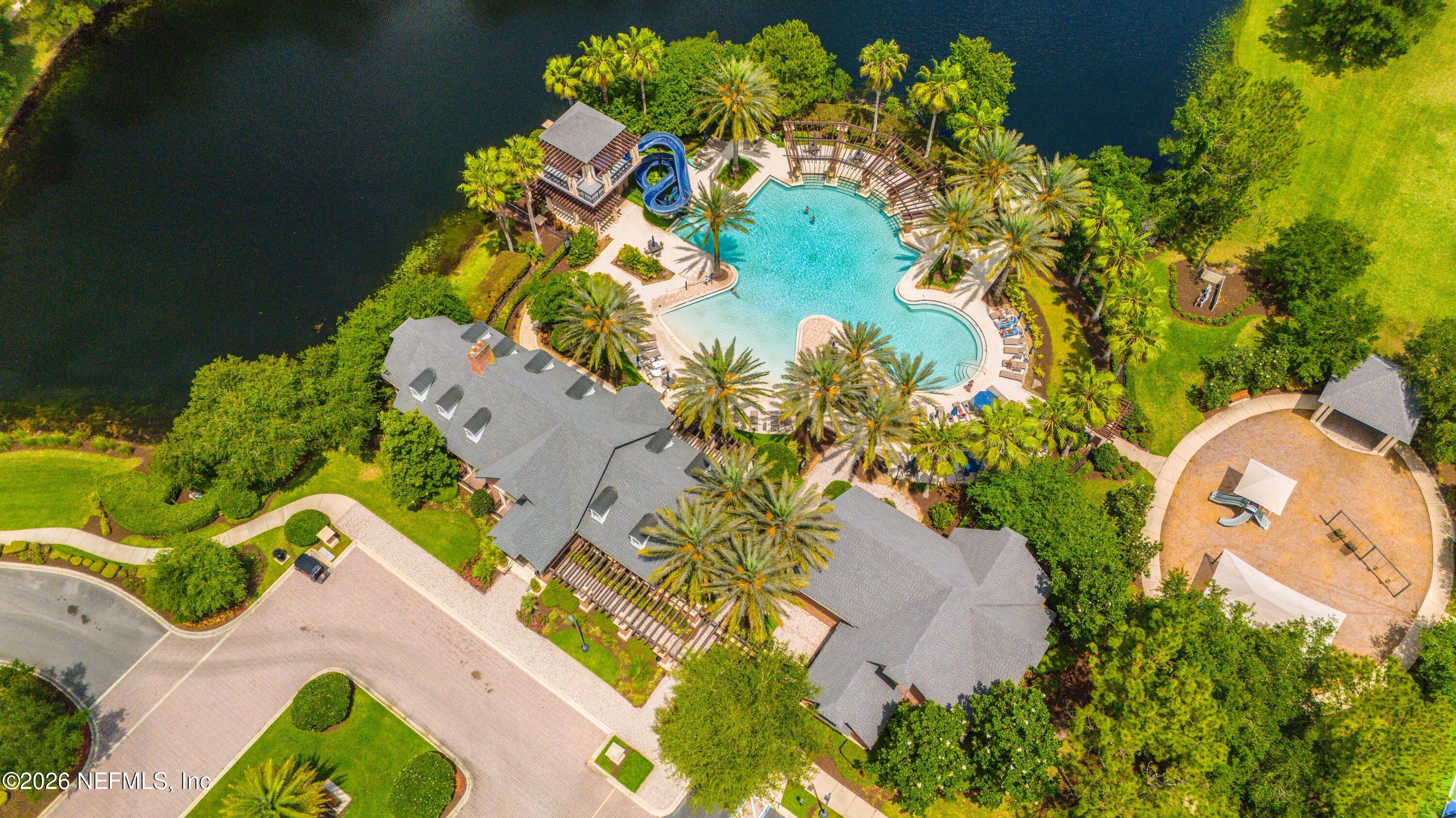 191 South Arabella Way St. Johns, FL 32259 - Photo 46 of 57 an aerial view of a house with a yard and garden space