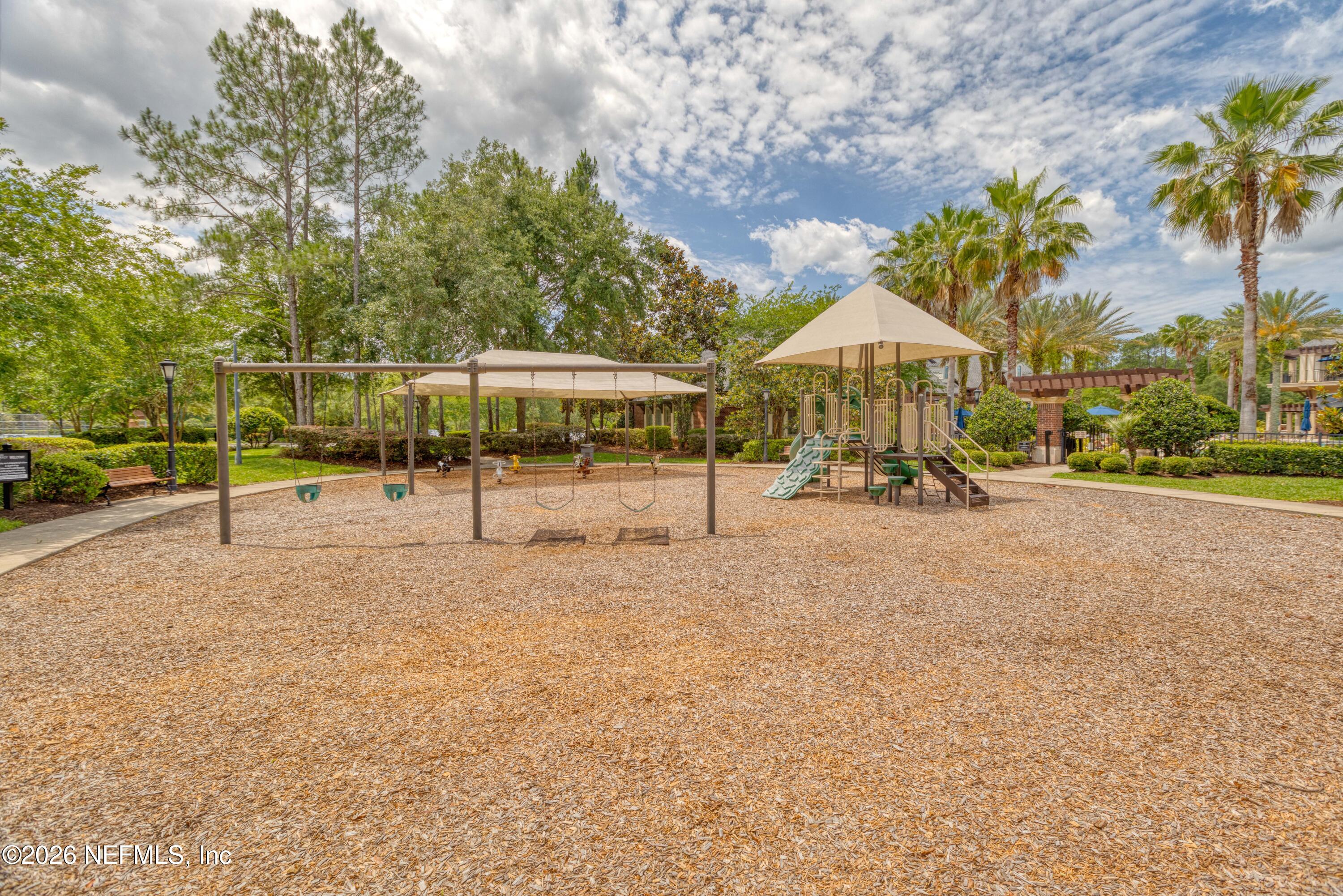 191 South Arabella Way St. Johns, FL 32259 - Photo 53 of 57 a view of a park with swings and slides