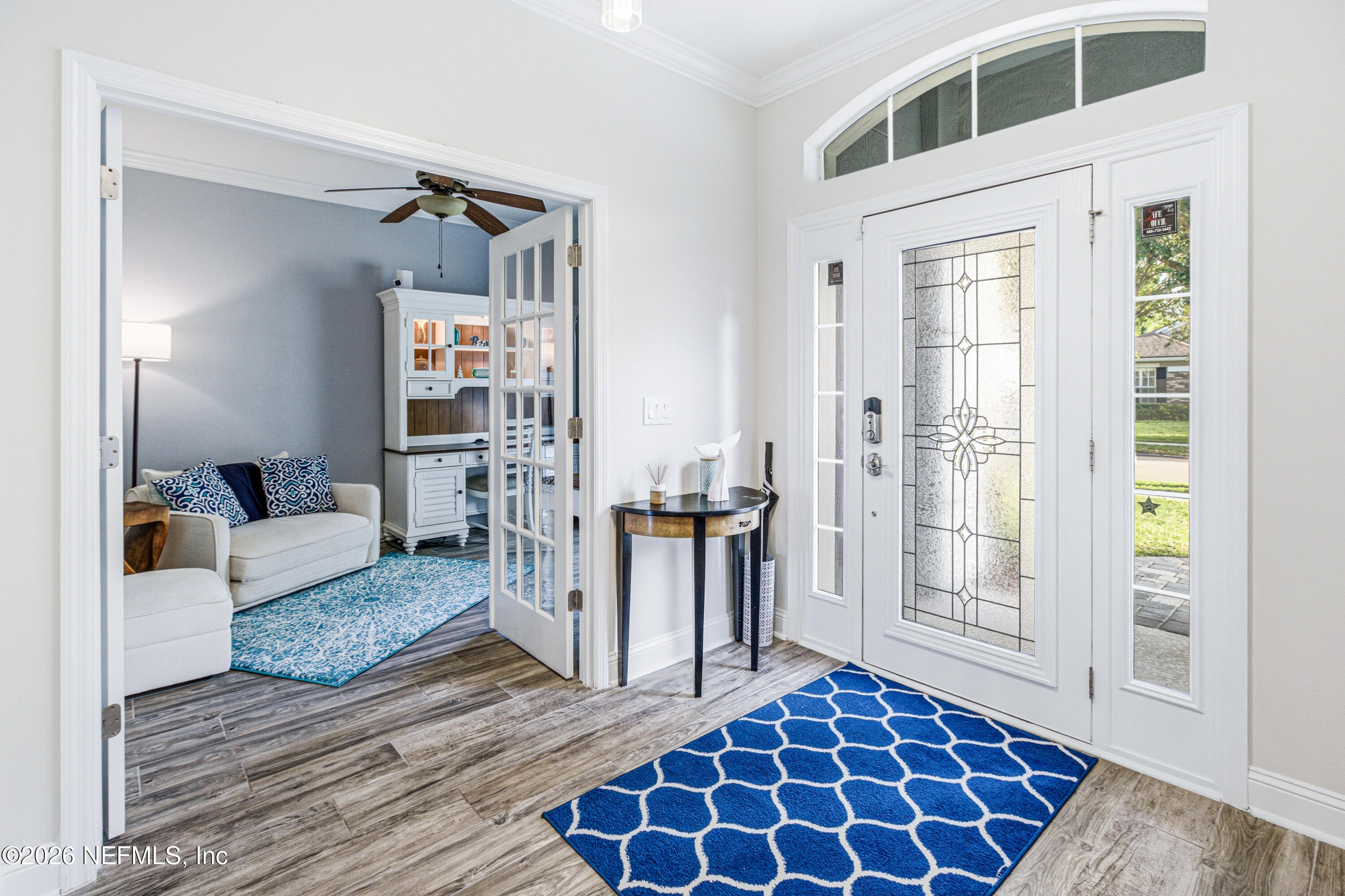 191 South Arabella Way St. Johns, FL 32259 - Photo 6 of 57 a living room with furniture and a rug