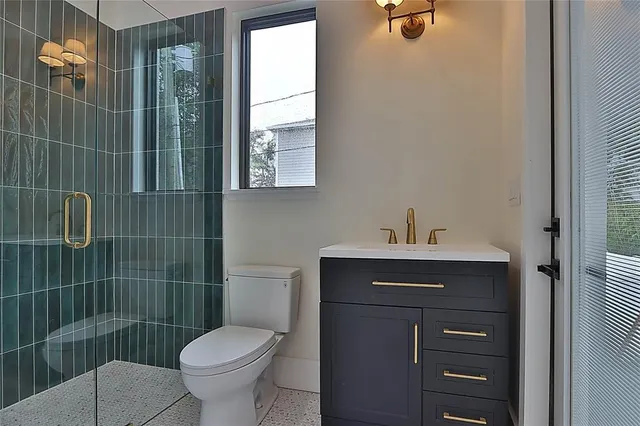 a view of a kitchen with a sink and an center island