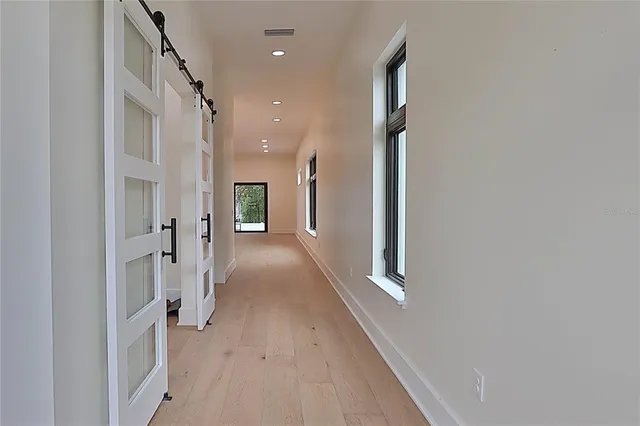 a kitchen with granite countertop a stove and a sink