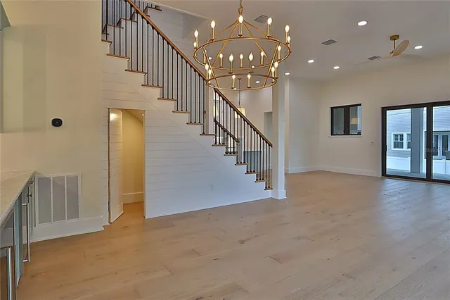 a kitchen that has a sink and a stove