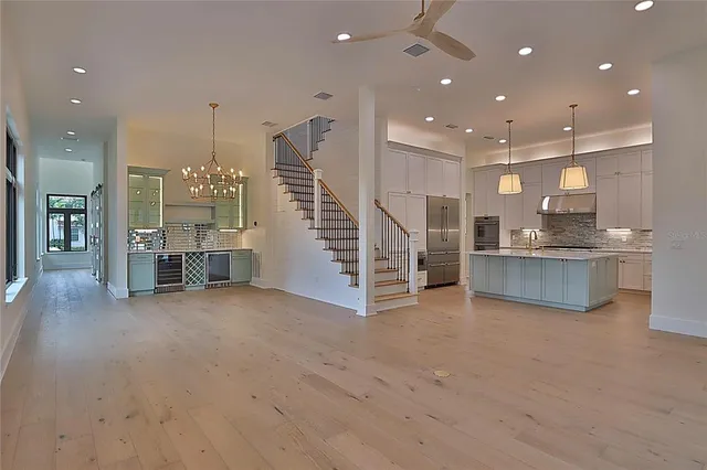 a view of a room with stairs and a window