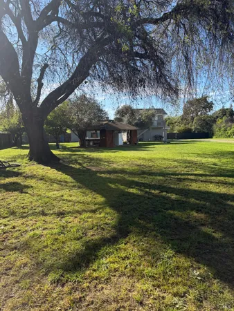 a yard with lake view