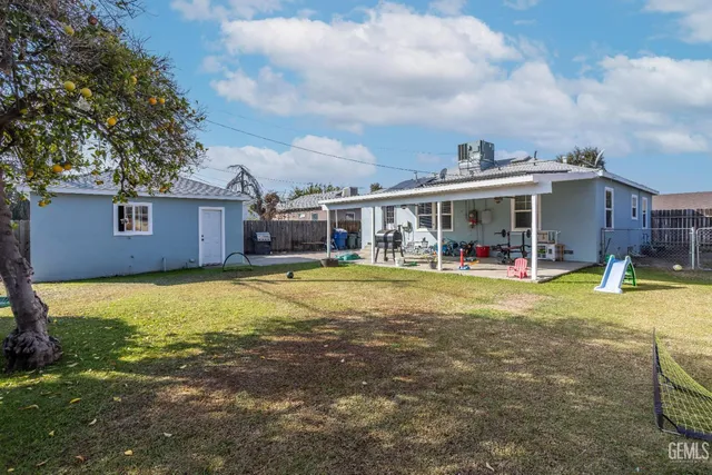 a view of a house with a swimming pool