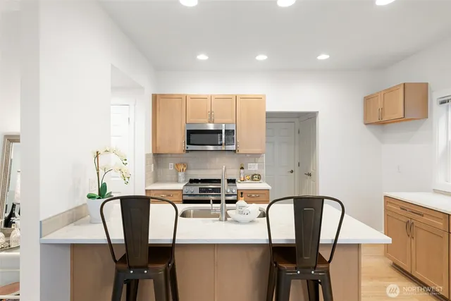 a table and chairs in a kitchen
