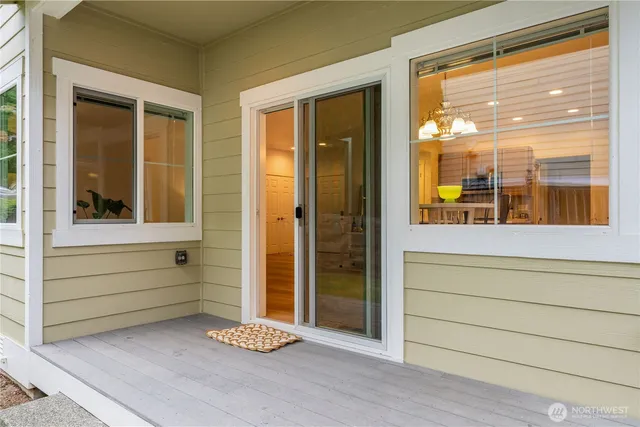 a view of front door of house with a window