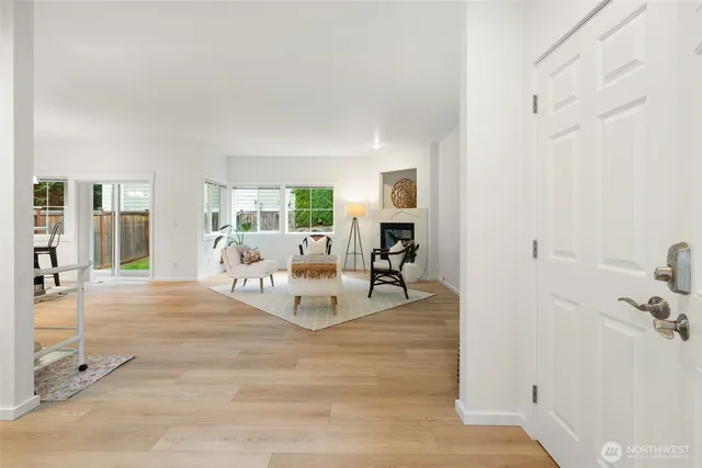 a living room with furniture and a table