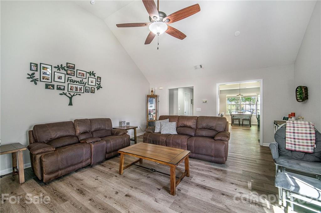 2778 Rustic Ridge Court Rock Hill, SC 29730 - Photo 12 of 34 a living room with furniture ceiling fan and a window