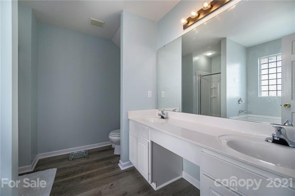 2778 Rustic Ridge Court Rock Hill, SC 29730 - Photo 22 of 34 a bathroom with a sink and a mirror