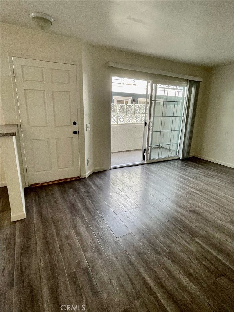 10920 Moorpark Street North Hollywood, CA 91602 - Photo 5 of 15 wooden floor in an empty room with a window
