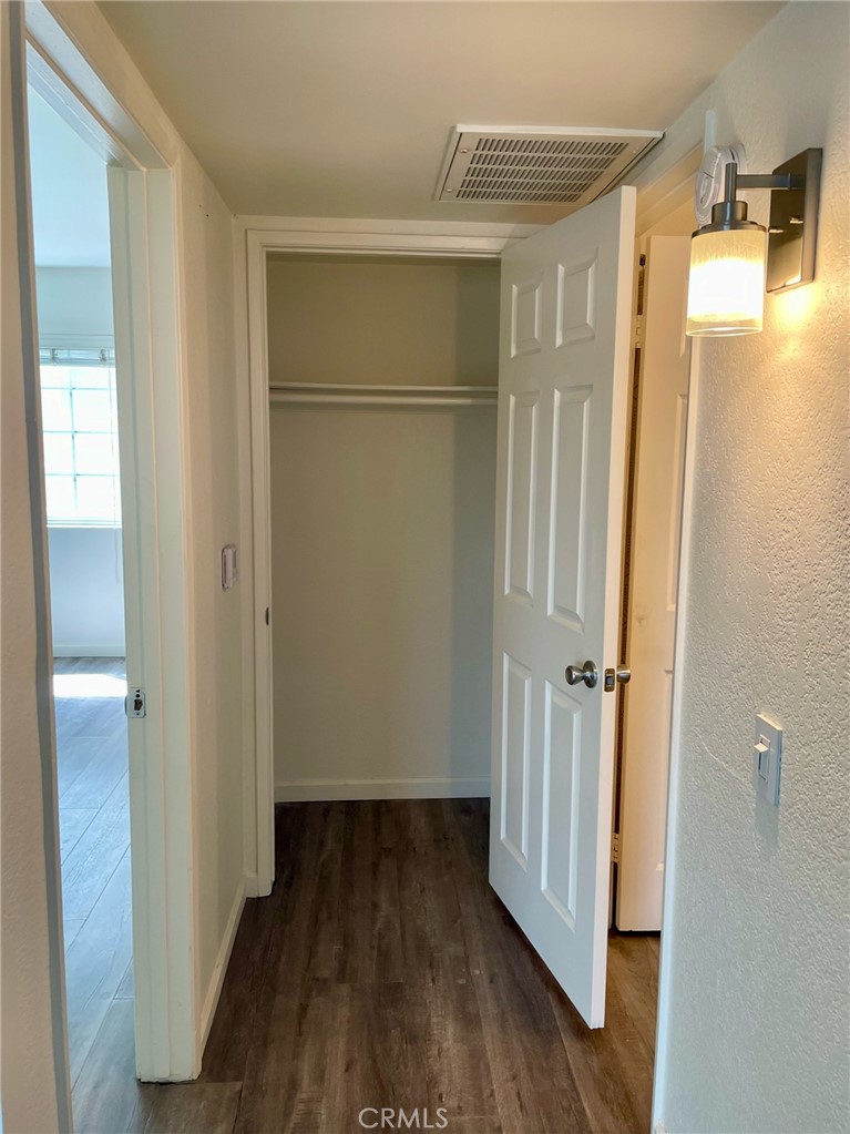 10920 Moorpark Street North Hollywood, CA 91602 - Photo 10 of 15 a view of a hallway with wooden floor
