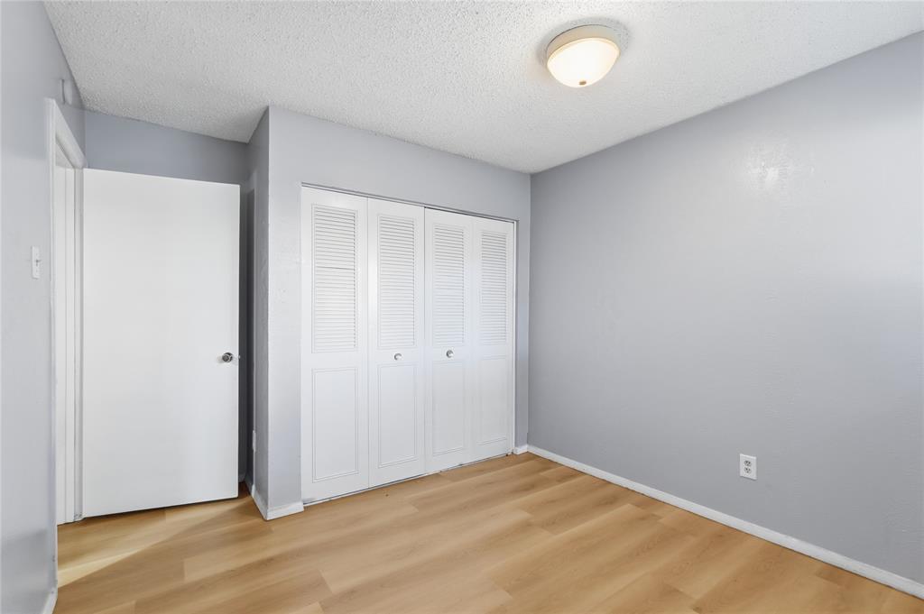 4211 Holland Avenue, Unit 105 Dallas, TX 75219 - Photo 20 of 26 a view of an empty room