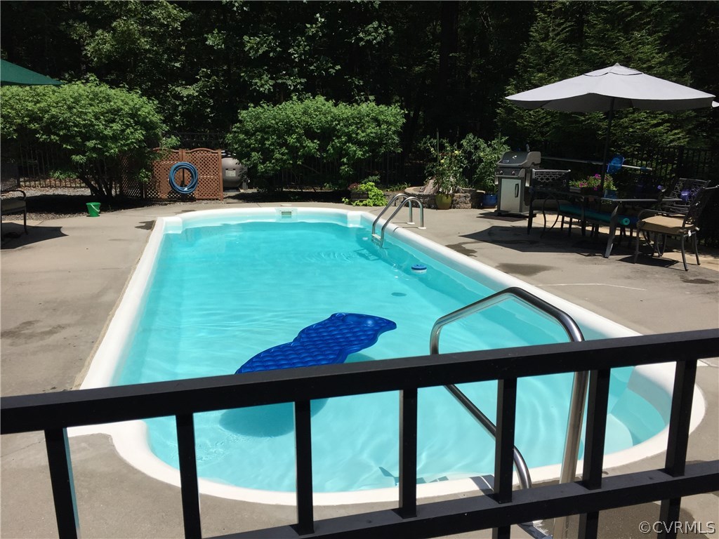 16045 Old Ridge Road Montpelier, VA 23192 - Photo 33 of 45 swimming pool view with a seating space