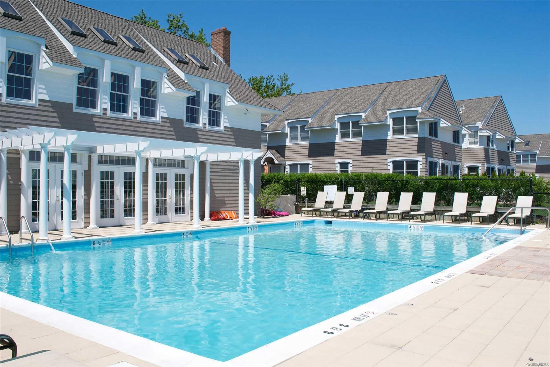 49 Canoe Place Road, Unit 413 Hampton Bays, NY 11946 - Photo 1 of 1 Bayfront Pool